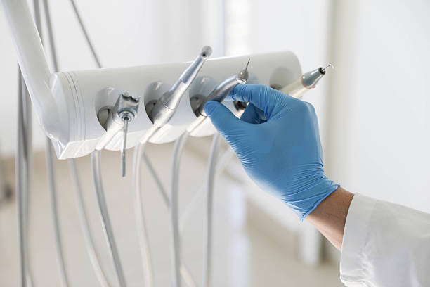 Professional Dental technician working in St. John, MO